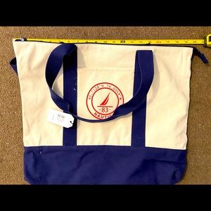 Nautica cross body style bag, canvas texture.